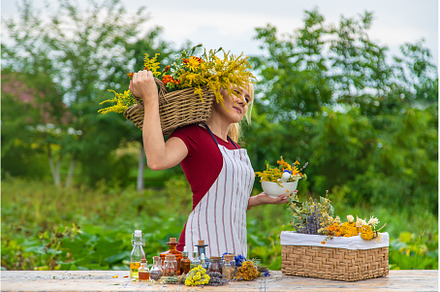 Woman with medicinal herbs and, a Nature Photo by yanadjana