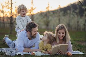 Family having picnic in spring, a Person Photo by HalfPoint