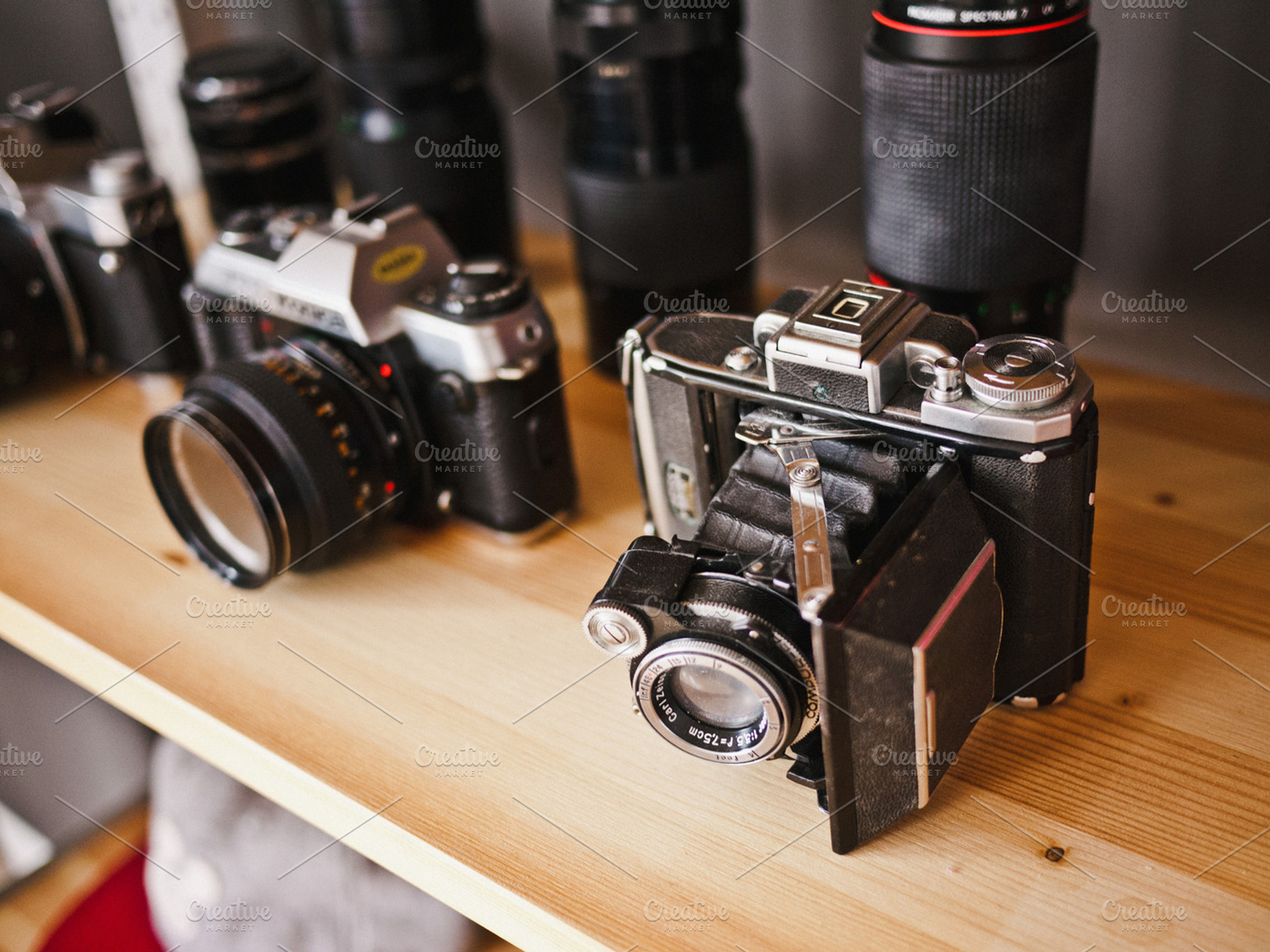 Vintage cameras stock photo containing workspace and desk, a Business Photo by ugmonk