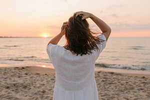 Woman Watching Beach Sunset, a Person Photo by Virgo Studio