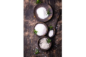 Natural sea salt crystals on dark, a Food & Drink Photo by Yulia Furman