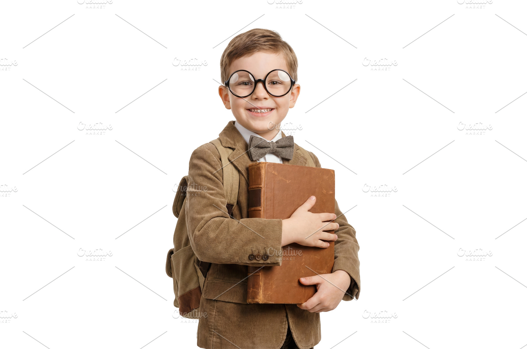 Happy Boy With a School Book, a School & Education Photo by CREATIVEDEF