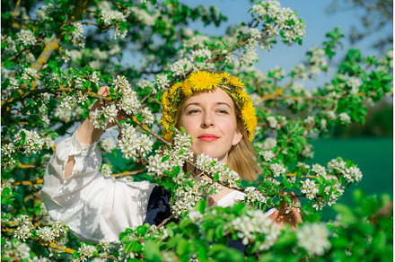 Beautiful feminime woman in national, a Holiday Photo by COLORFUL