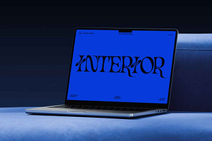 Macbook on a Couch Mockup