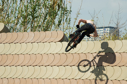 Unrecognizable BMX rider performing 