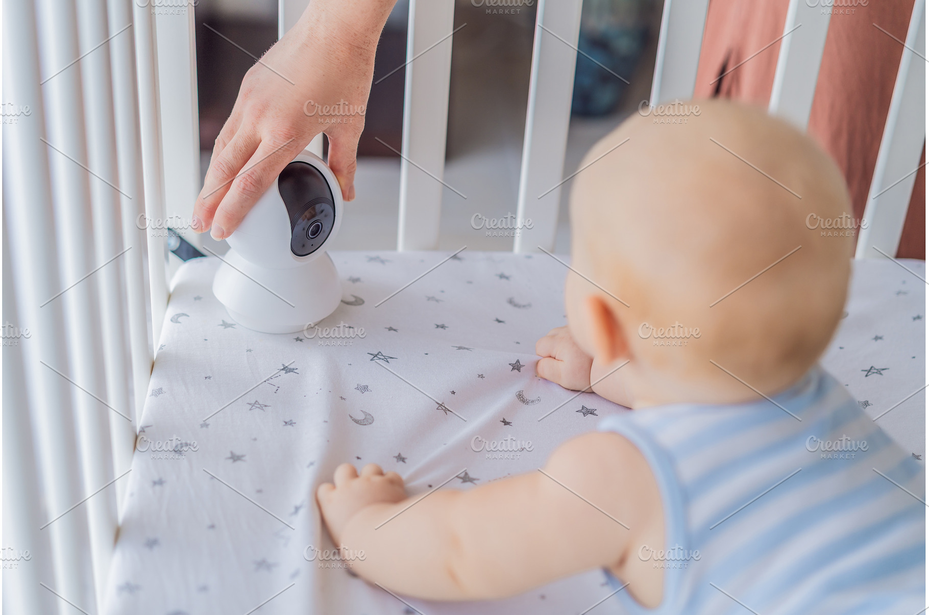 Baby monitor camera placed inside a, a Technology Photo by Elizaveta Galitskaya