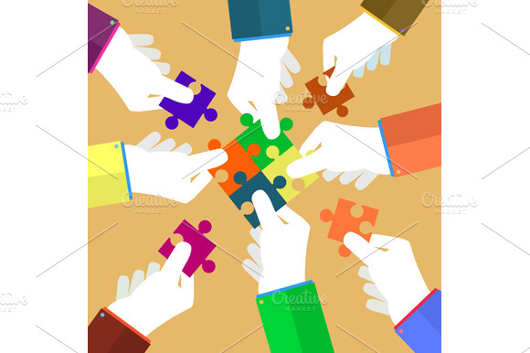 Businessman Assembling Jigsaw Puzzle