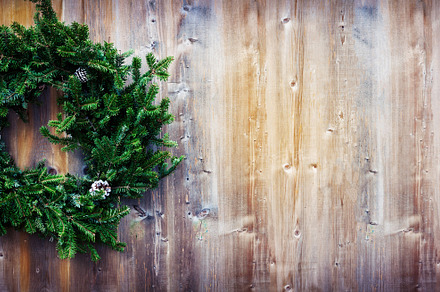 Christmas wreath featuring background, wreath, and rustic