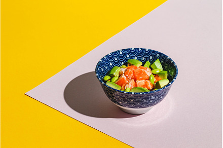Poke bowl with rice, avocado, a Food & Drink Photo by Irina Burakova