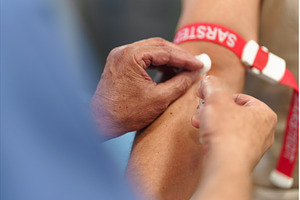 Close up of drawing blood from, a Health & Medical Photo by HalfPoint