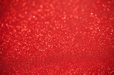 Red glitter surface with red light bokeh  it can be used for background for, an Abstract Photo by Twinster Photo