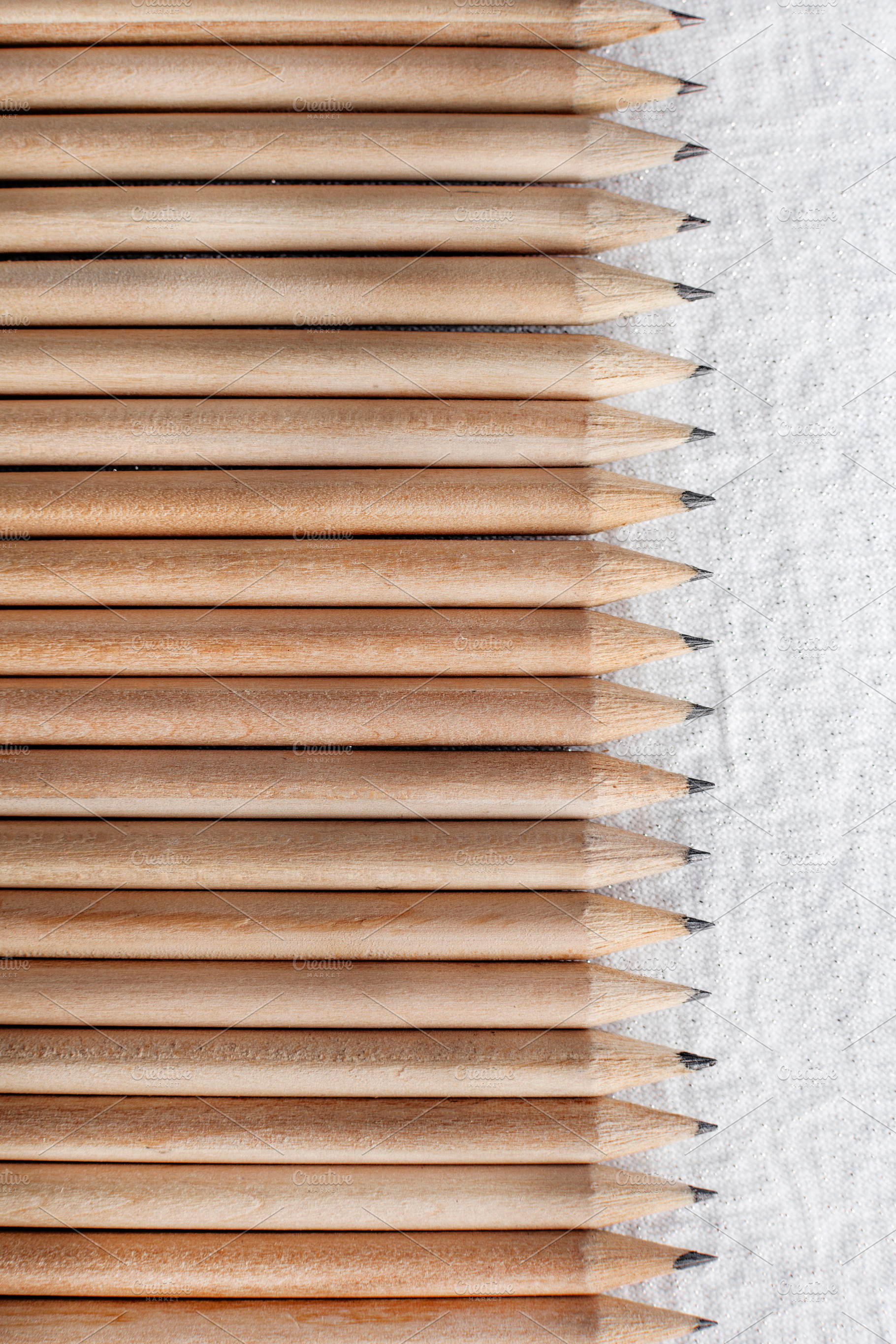 Group of wooden pencils containing pencils, pencil, and crayon, a School & Education Photo by RaquelVizcaíno