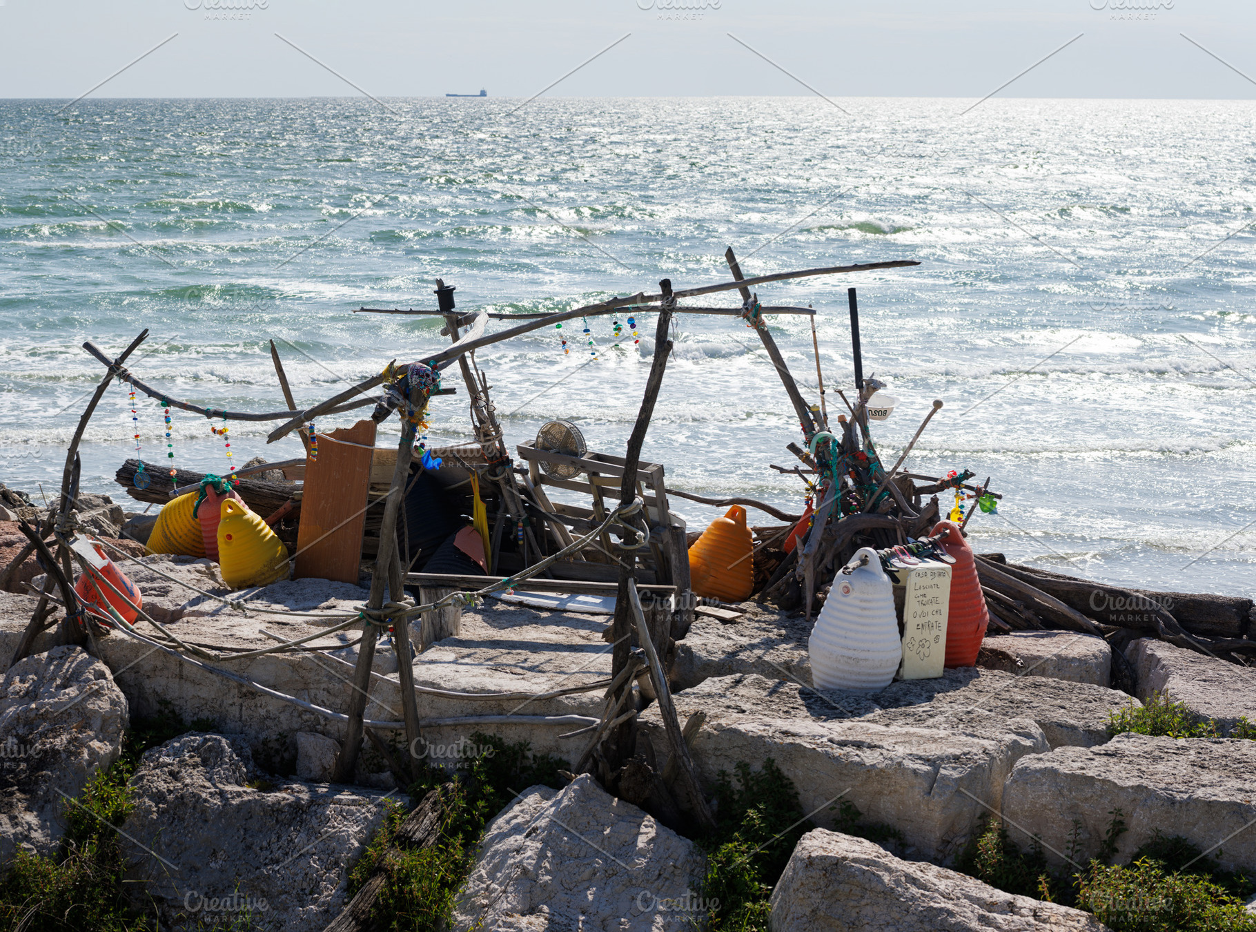Wooden huts at the Murazzi beach on Pellestrina lagoon, a Nature Photo by Bepslabor