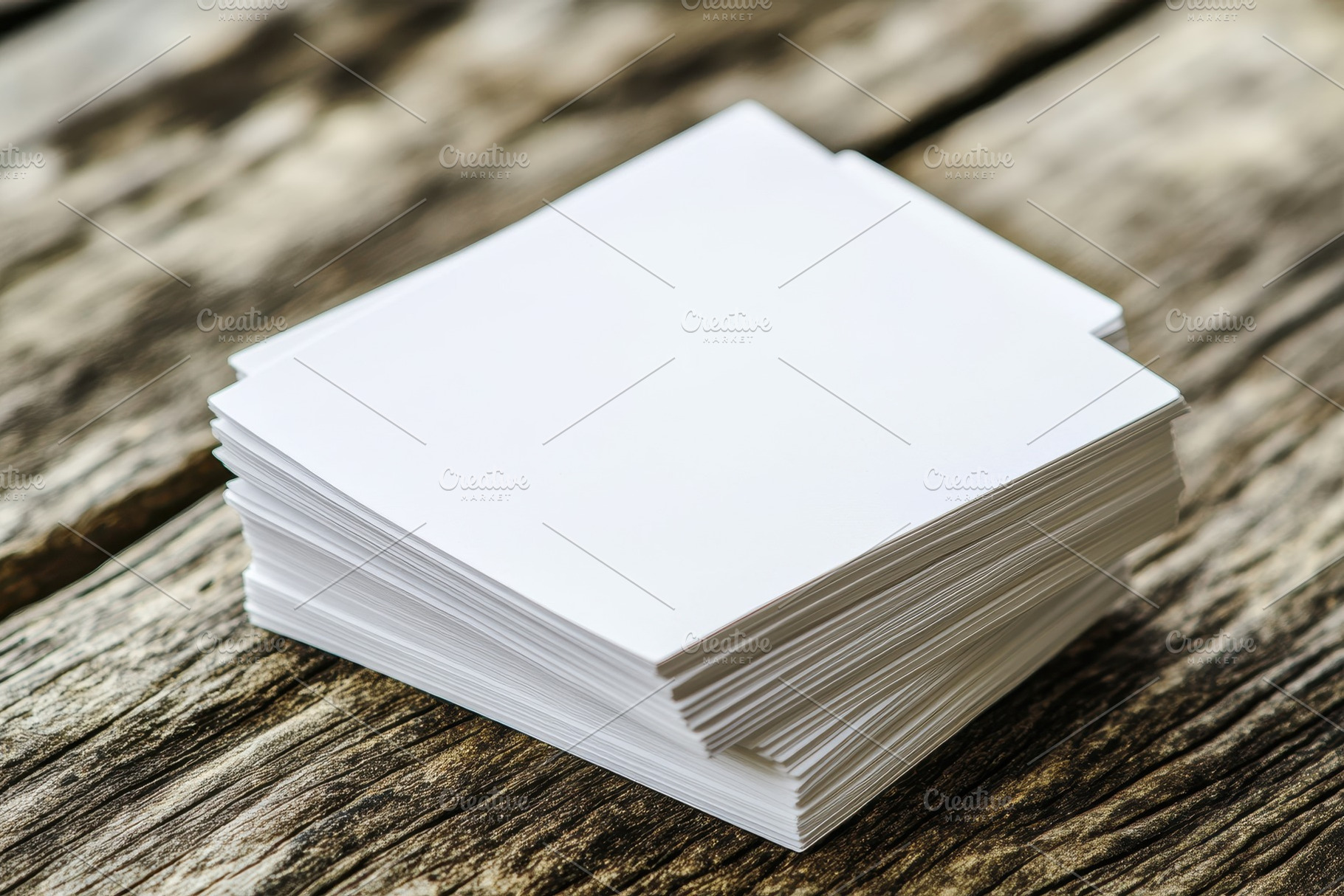 Blank white cards stacked neatly on, a Photo by Iftikhar Alam