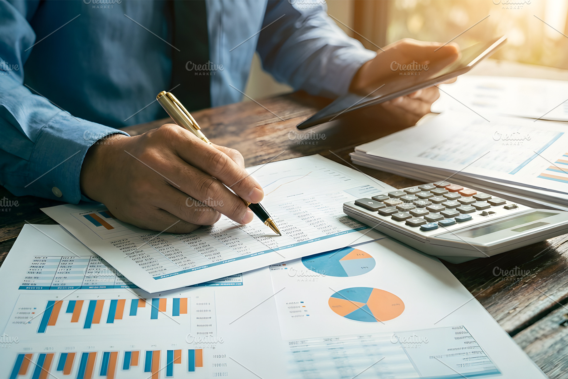 Person analyzing financial documents, a Business Photo by nandinigraphics