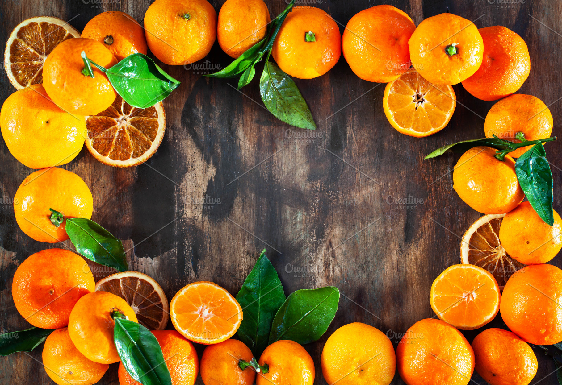 Frame of fresh ripe tangerines with, a Food & Drink Photo by Kate S
