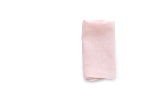 Flat lay with pink linen kitchen napkin isolated on white backgr, a Food & Drink Photo by Asya Nurullina