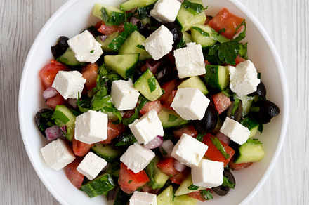 Homemade Shepherd's salad with cucumbers, feta and parsley in a, a Food & Drink Photo by LiudmylaChuhunova