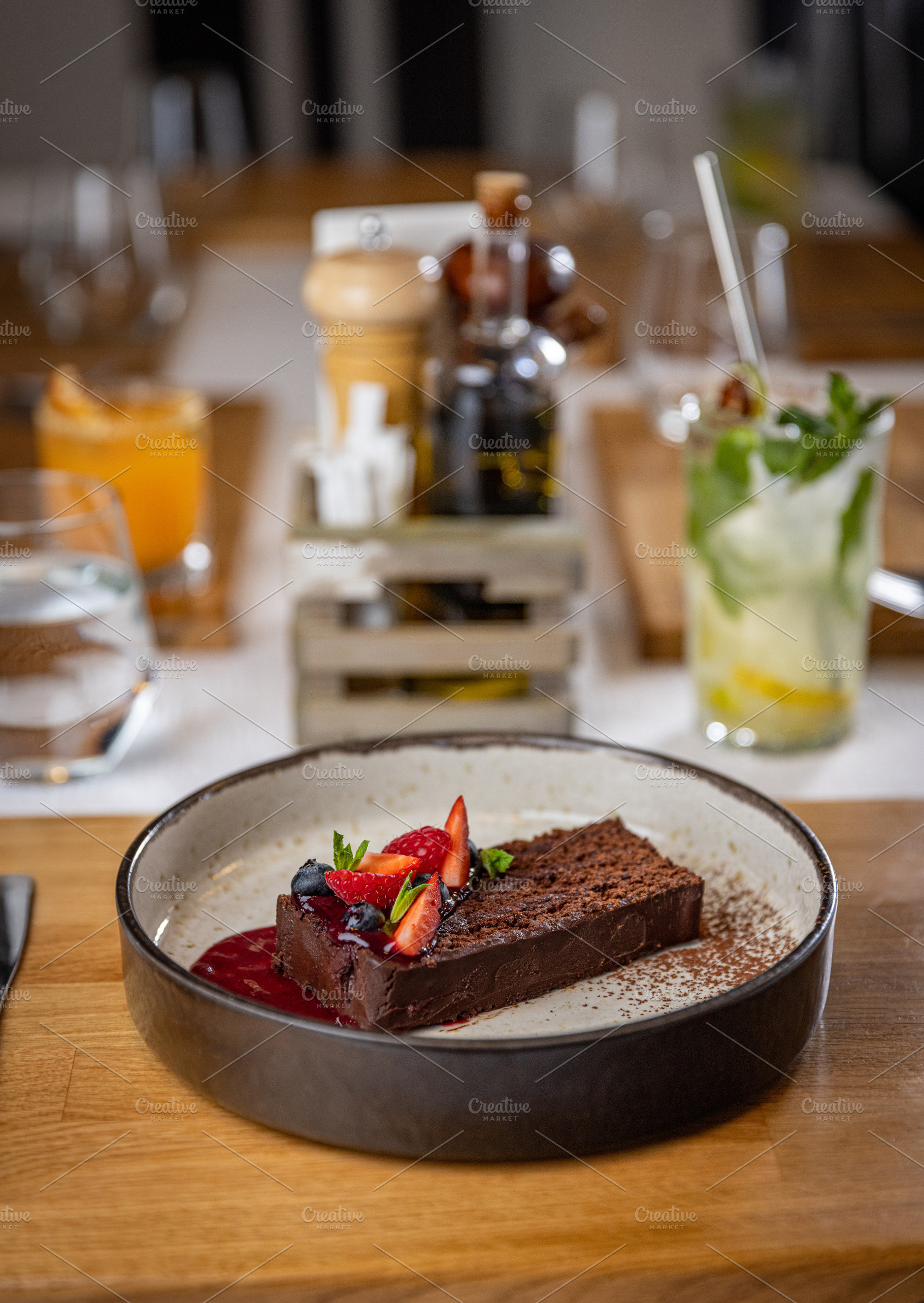 Chocolate cake with fresh berries, a Photo by Grafvision photography