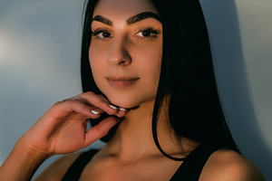 Glowing skin confident model face hair radiant, a Person Photo by Photo Drive Studio