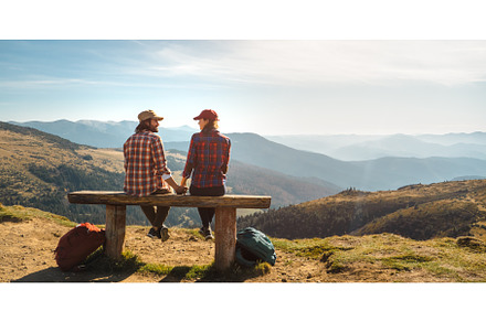 Couple of Hikers With Backpacks in