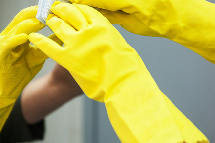 Cleaning concept photo featuring spray, detergent, and person, a Person Photo by Jan Jack Russo Media