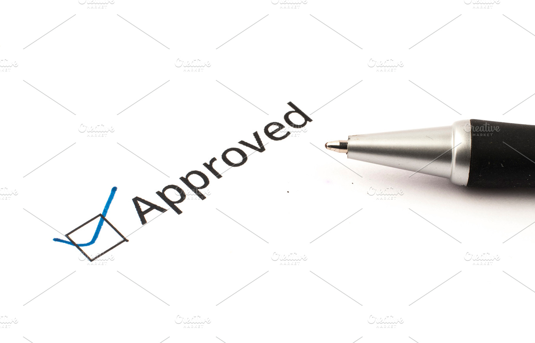 approved tick with pen