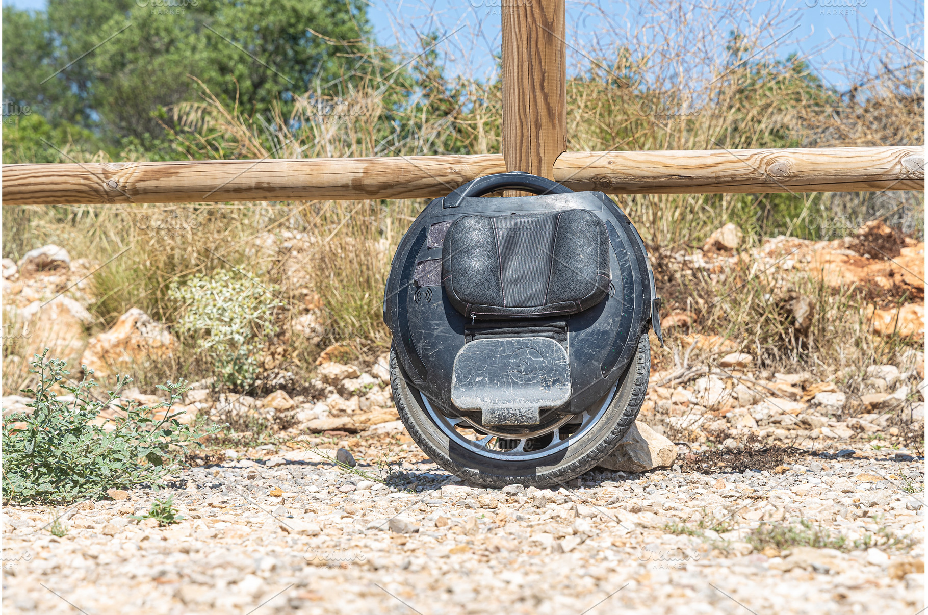 Electric unicycle leaning against, a Sports & Recreation Photo by Illustrations&photos