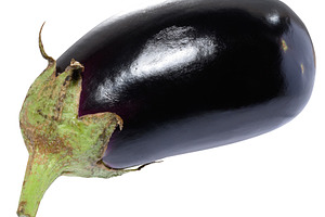 Eggplant with a dark purple, glossy surface. The vegetable has a, a Food & Drink Photo by ndanko