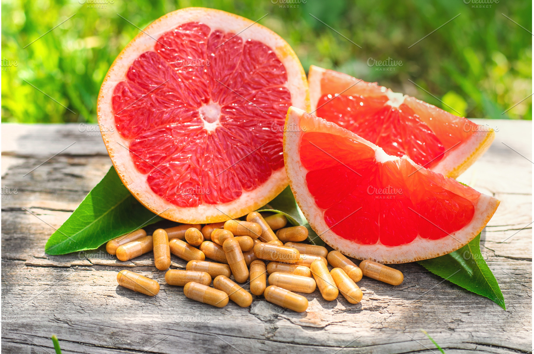 grapefruit essential oil in a bottle, a Beauty & Fashion Photo by yanadjana
