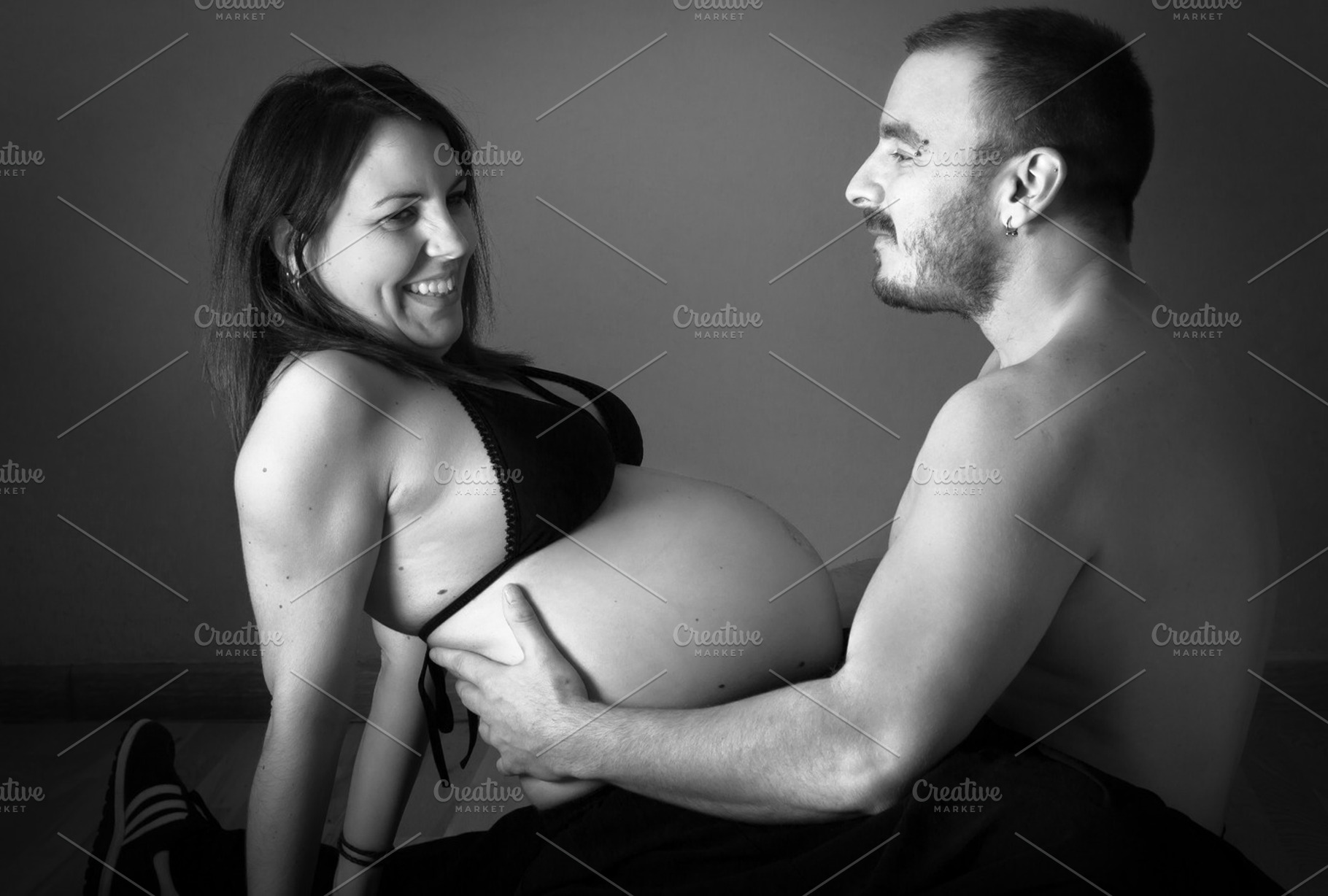 Happy pregnant couple featuring pregnancy, pregnant couple, and woman, a Person Photo by Perpis