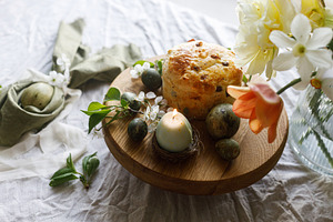 Easter celebration. Stylish green easter eggs in bunny ears napk, a Holiday Photo by Sonjachni
