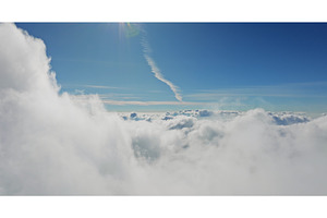 Aerial view flying above clouds with, a Nature Photo by Goinyk