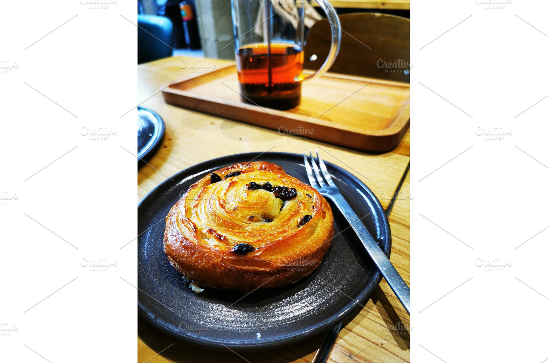 Pain suisse with raisins pastry, a Food & Drink Photo by sceptical cactus