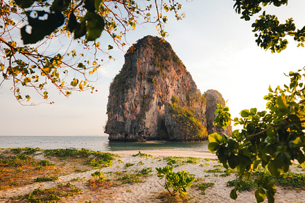 Railay Beach with rocky mountains in the evening, a Nature Photo by Art Rachen