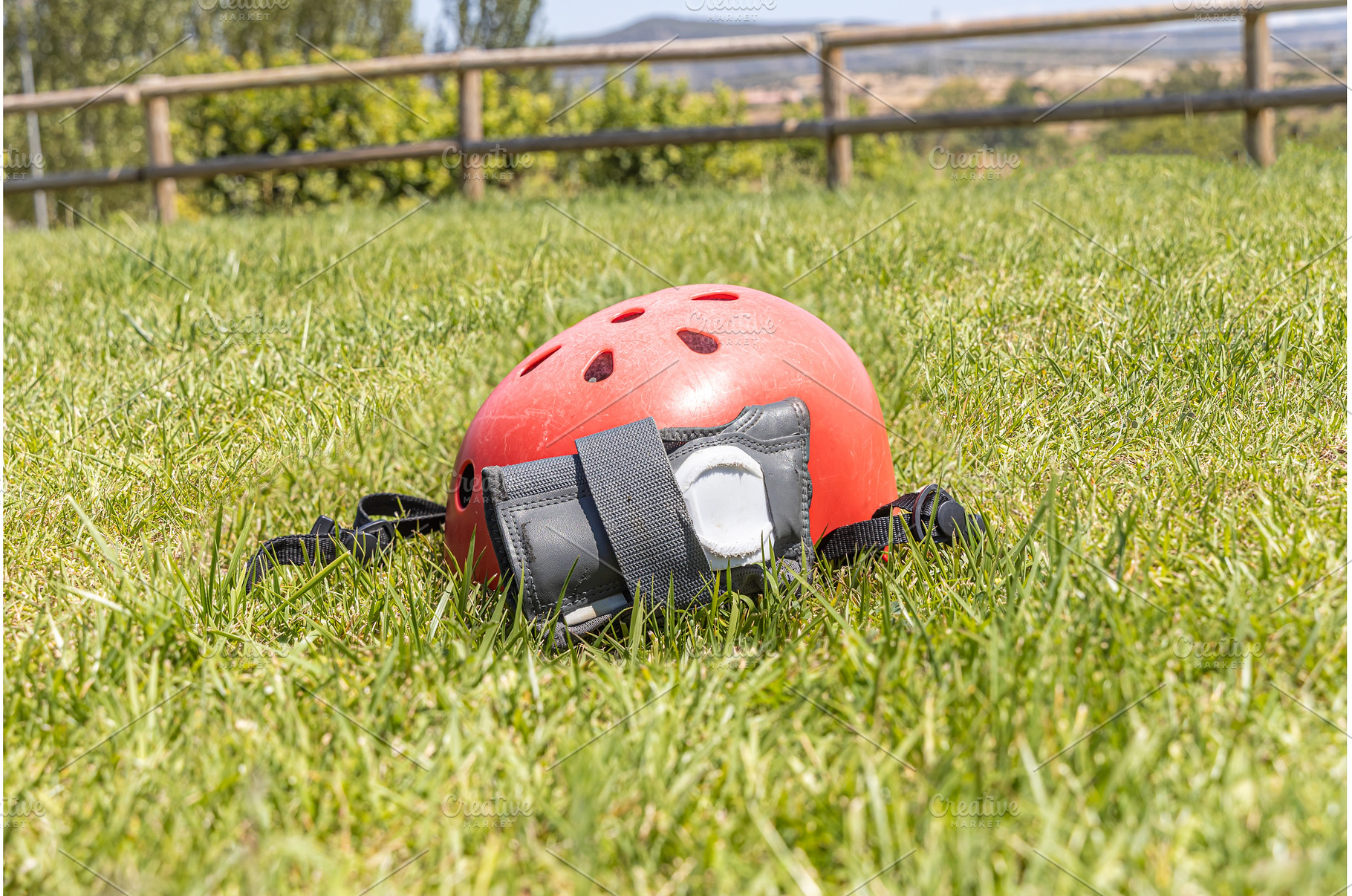 A red helmet and A gray wrist guard, a Technology Photo by Illustrations&photos