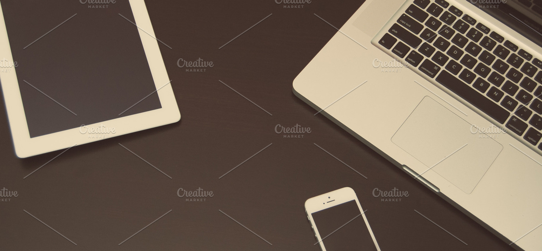 Mobile devices containing mac, macbook, and ipad, a Technology Photo by bozekmichal