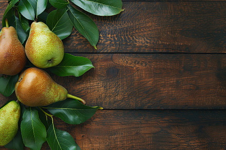 Red pears with leafs and copyspace for text on wooden table, a Food & Drink Photo by AlyaAnd