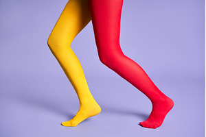 Long slim woman legs in multicolor, a Beauty & Fashion Photo by Gladkov photography