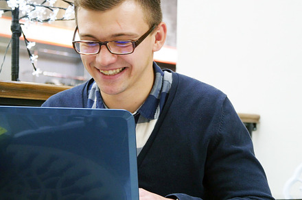 Man are working on a laptop featuring business, cafe, and center, a Person Photo by Footage Autor
