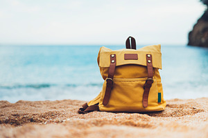 Backpack on the beach stock photo containing backpack and tourist