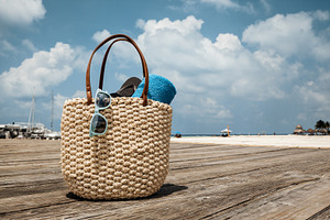 Straw Bag On Wooden Bridge