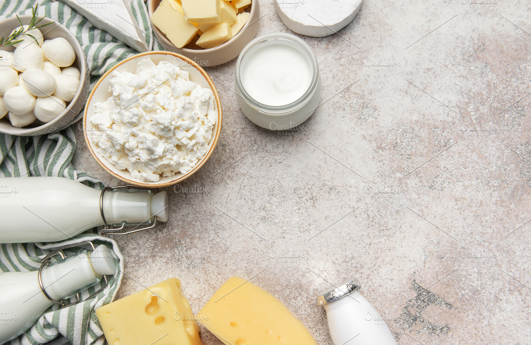 Assortment of fresh dairy products providing healthy nutrition, a Food & Drink Photo by Olena Rudo
