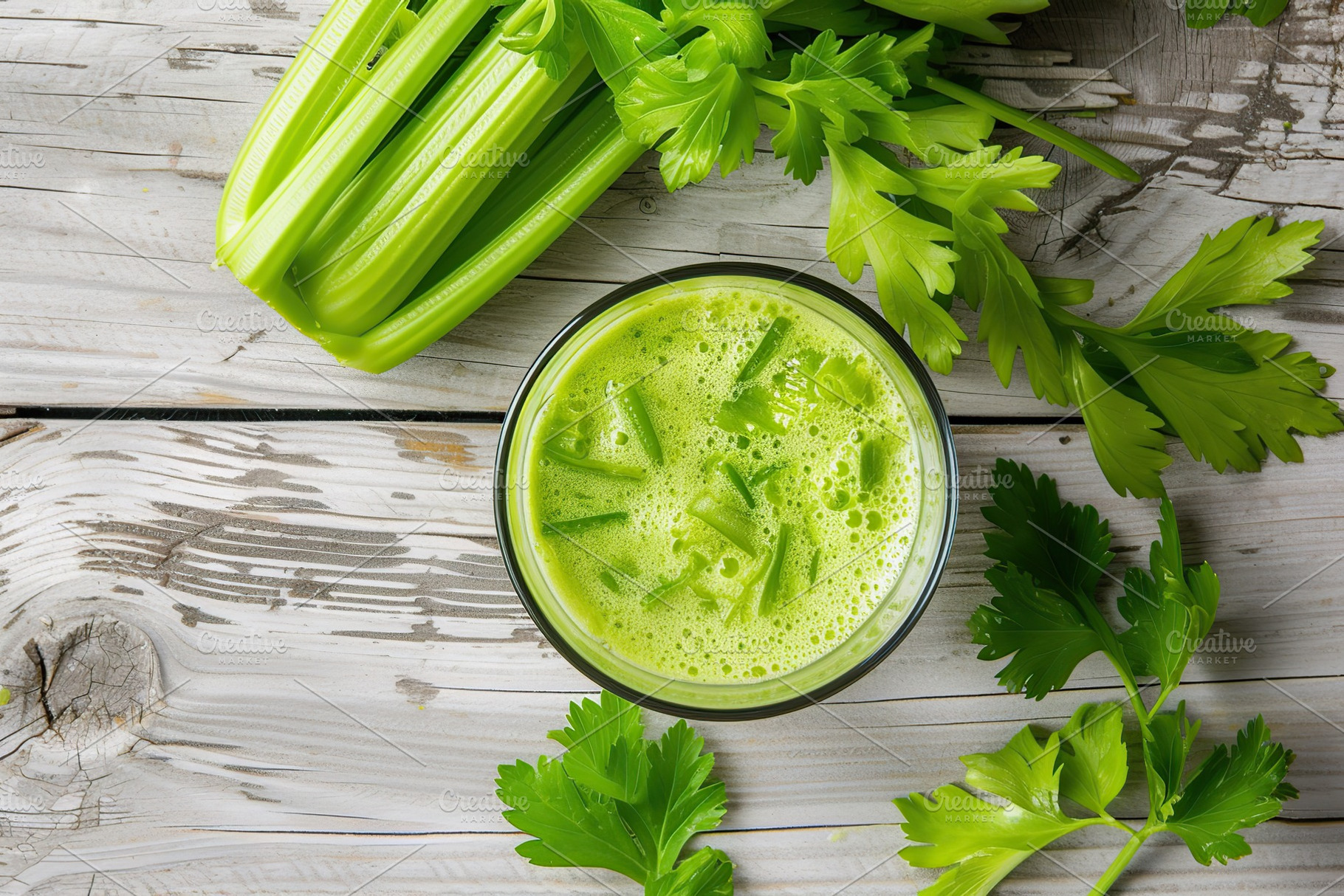 Fresh celery juice in glass on wooden table, a Food & Drink Photo by AlyaAnd