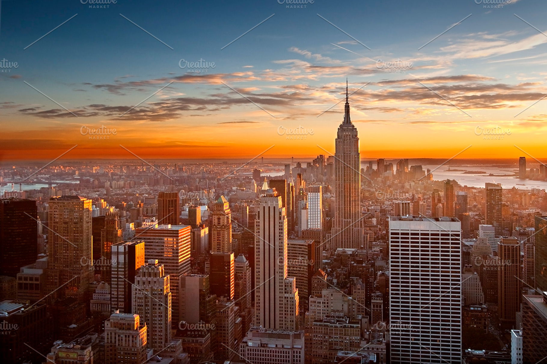 Sunset over manhattan containing sunset, sky, and skyline, an Architecture Photo by inigocia