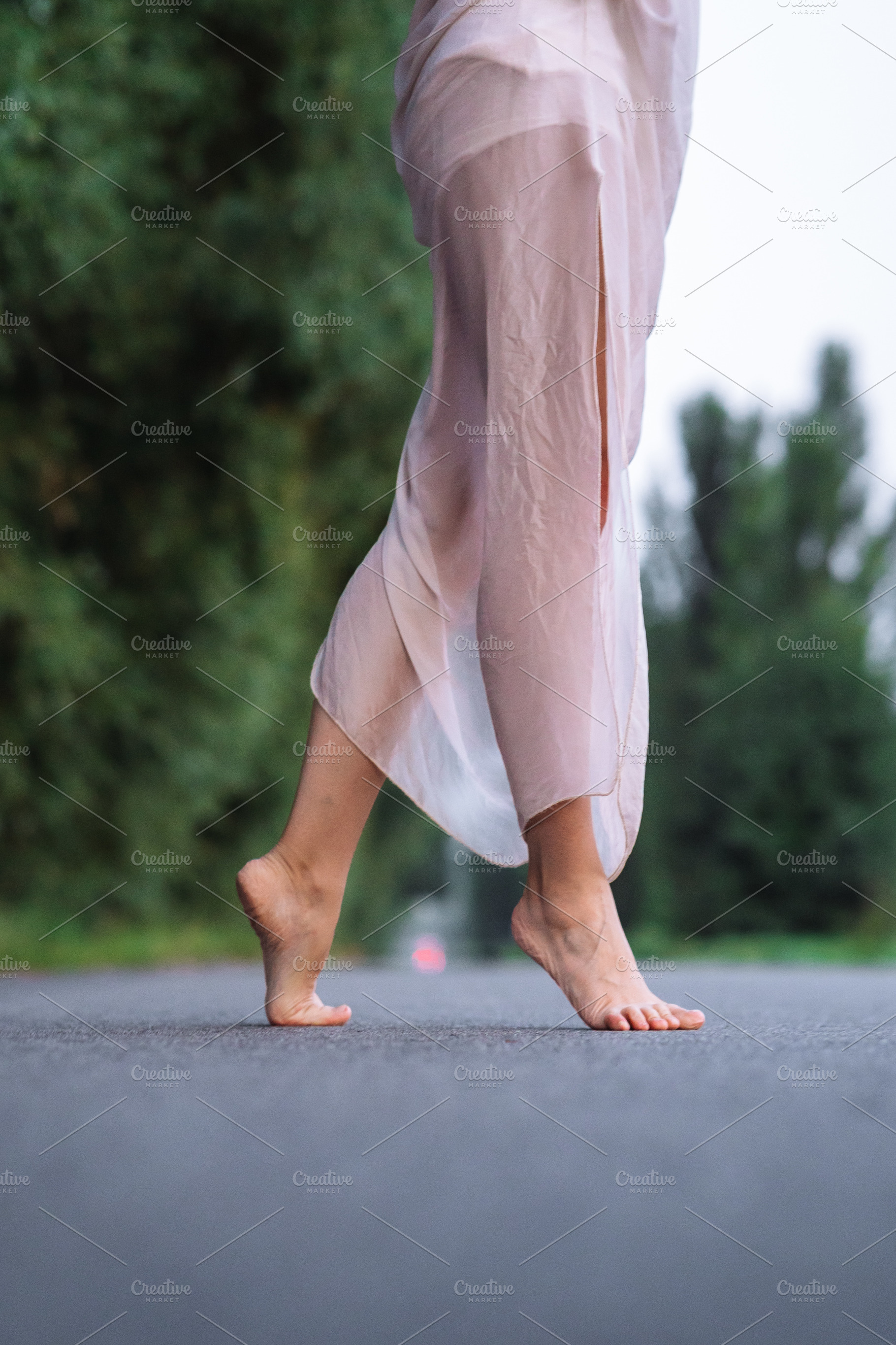 Barefoot Woman Walking on Road, a Person Photo by Red Hot Chili Pepper Shop