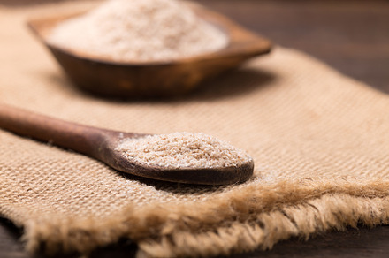 Portion of psyllium seeds featuring psyllium, husk, and brown