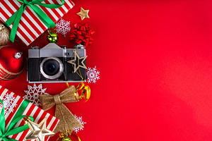 High-colored background with Christmas gifts, festive baubles, r