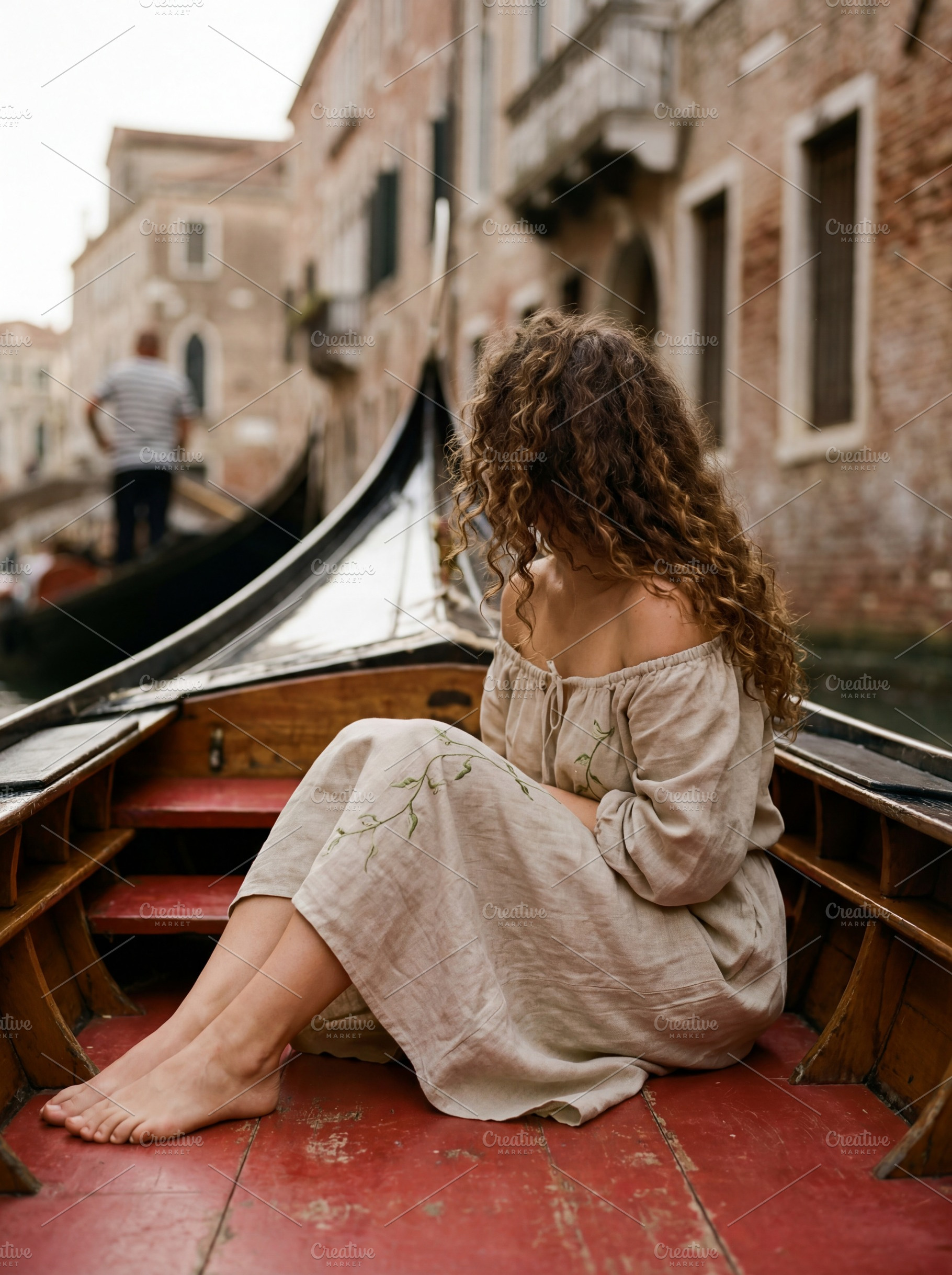 Romantic Boat through Venetian Canal, a Person Photo by Virgo Studio