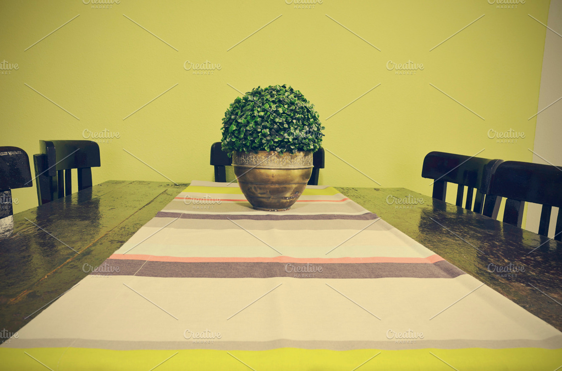 Dining table with vase and table runner, an Architecture Photo by neftali77